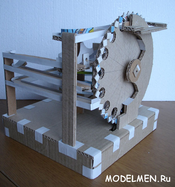 Toy with balls, made of cardboard (Marble machine)