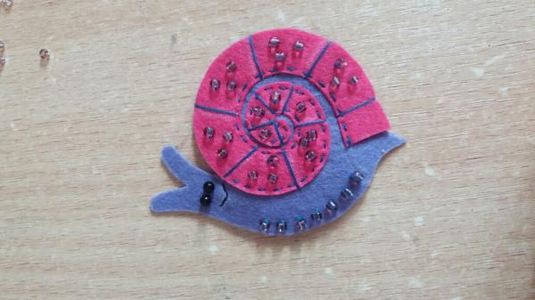 Brooch made of felt snail. Master Class.