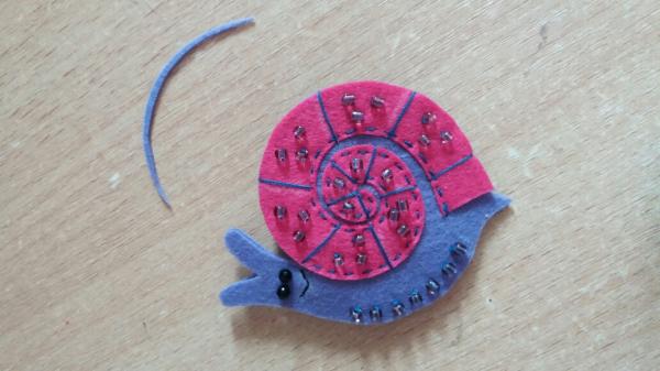 Brooch made of felt snail. Master Class.